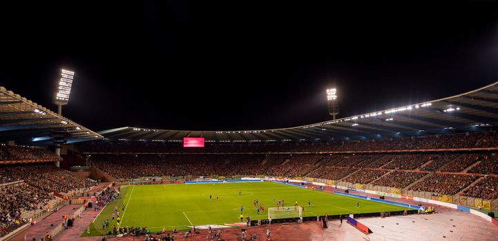 a professional footbal soccerl stadium before the start of the match