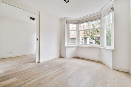 Spacious, bright and beautiful room with large windows and parquet floors