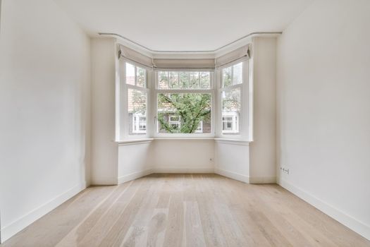 Spacious, bright and beautiful room with large windows and parquet floors