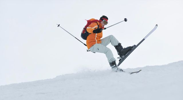 man ski free ride downhill at winter season on beautiful sunny day and powder snow