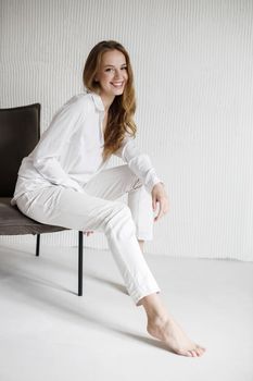 Portrait of a young happy woman indoor. High quality photo