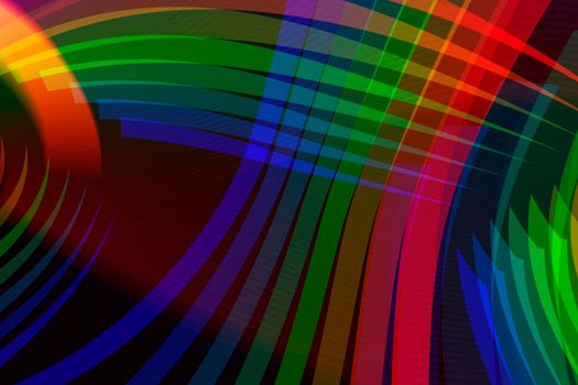 Abstract black background with rainbow highlights of light.