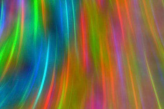 Abstract neon background with rainbow highlights of light.