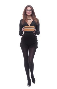 in full growth. elegant young woman with a stack of books . isolated on a white background.