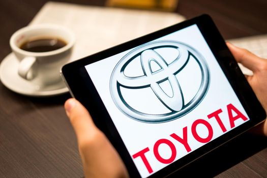 New York, New York / USA - 11 11 2019: Logo of Toyota on the iPad Air2 in on office desk