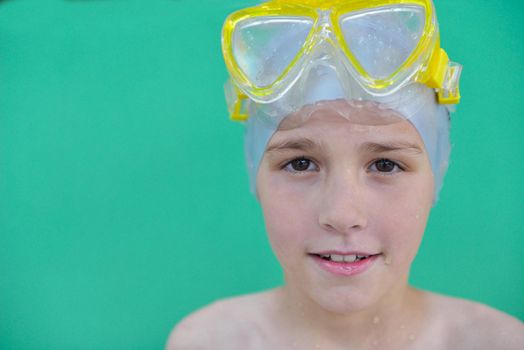 happy little child portrait on swimming school classes and recreation at indoor pool