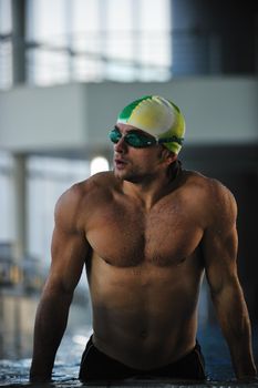 health and fitness lifestyle concept with young athlete swimmer recreating  on olimpic pool