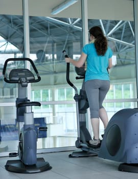 healthy people running on threadmill at sport club representing sport recreation exercise and healthy lifestyle concept