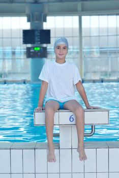 health and fitness lifestyle concept with young athlete swimmer recreating  on indoor olimpic pool