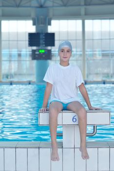 health and fitness lifestyle concept with young athlete swimmer recreating  on indoor olimpic pool