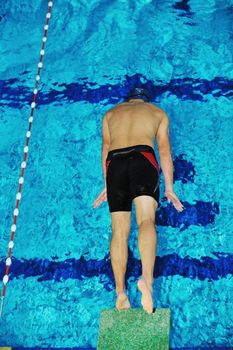 health and fitness lifestyle concept with young athlete swimmer recreating  on olimpic pool