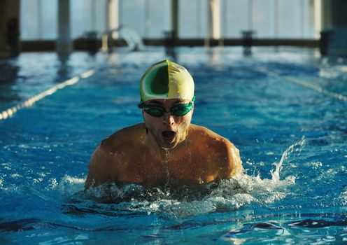 health and fitness lifestyle concept with young athlete swimmer recreating  on olimpic pool