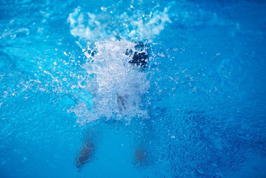 swimmer excercise on indoor swimming pool, sport and health concept