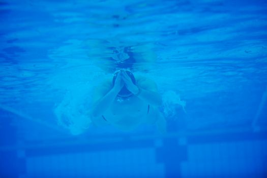 sport swimming pool  underwater with blue color and swimmers