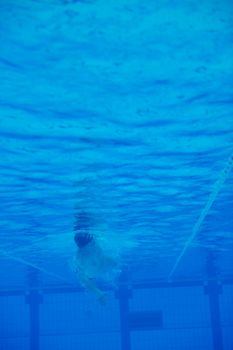 sport swimming pool  underwater with blue color and swimmers