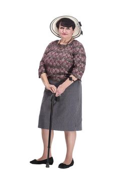 elderly woman with a walking stick in a summer hat. isolated on a white background.