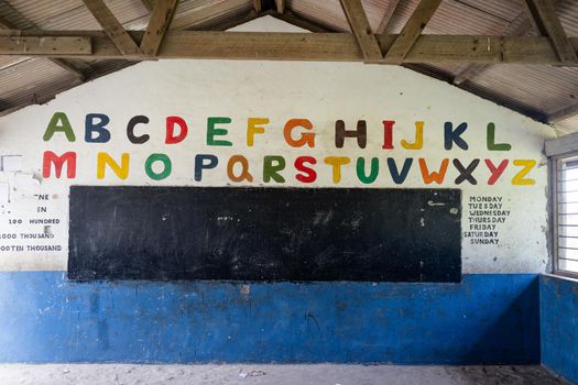 Decorated poor school classroom in Africa with no children