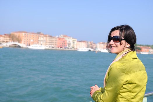 Beautiful tourist woman in Venice, exploring the old city