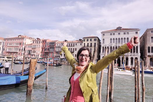 Beautiful tourist woman in Venice, exploring the old city