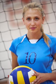 volleyball game sport with group of young beautiful girls indoor in sport arena school gym