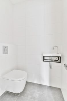 Modern and sleek bathroom with gray tiled floor