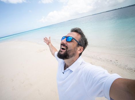 One man is enjoying beautiful tropical beach