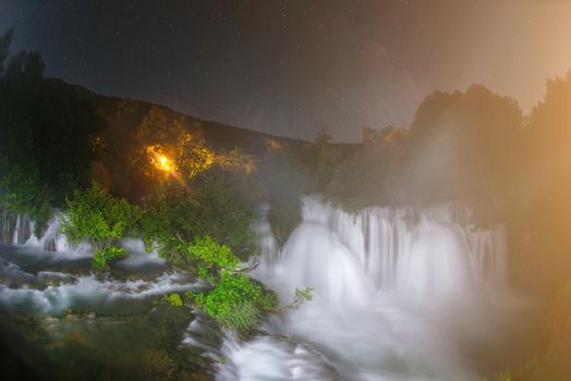 waterfalls in dark night beautiful nature with crystal clear water on wild river una in bosnia and herzegovina