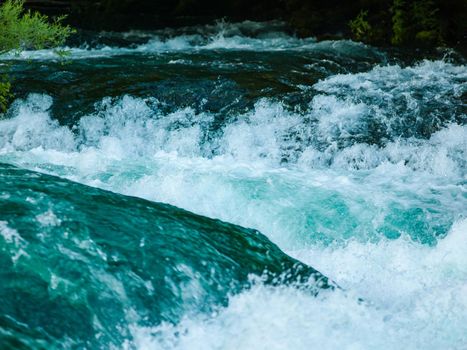 waterfall in beautiful nature with crystal clear water on wild river una in bosnia and herzegovina at sunny summer day