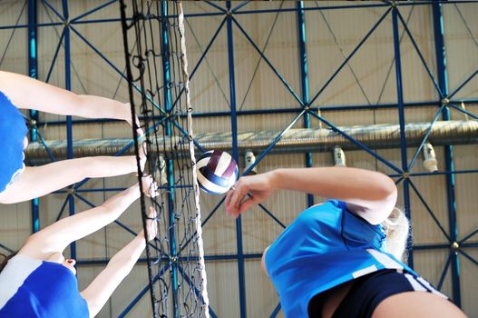 volleyball game sport with group of girls indoor in sport arena