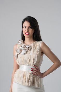 Portrait of beautiful young women in wedding dress isolated on a white background