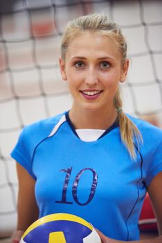 volleyball game sport with group of young beautiful girls indoor in sport arena school gym