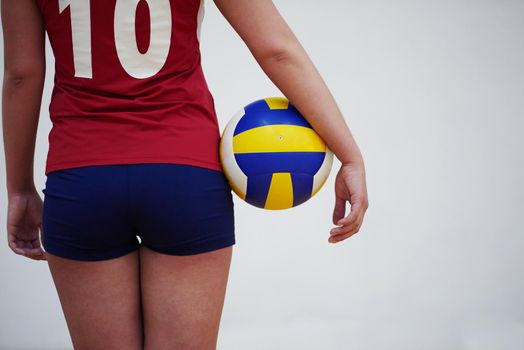 volleyball woman jump and kick ball isolated on white background