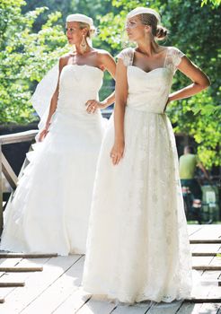 beautiful bride woman people in fashion wedding dress posing outdoor in bright park