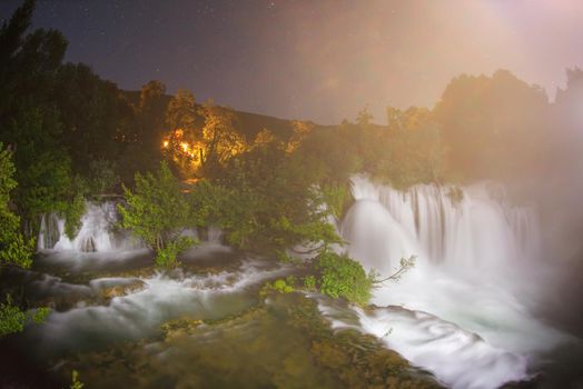 waterfalls in dark night beautiful nature with crystal clear water on wild river una in bosnia and herzegovina
