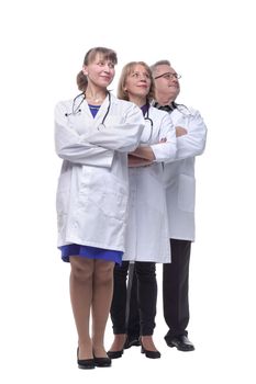 Portrait of group of smiling hospital colleagues standing together isolated over white background