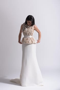 Portrait of beautiful young women in wedding dress isolated on a white background