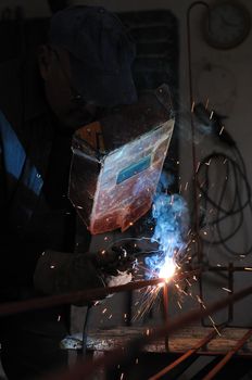 weld machine worker hard industry business