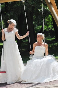 beautiful bride woman people in fashion wedding dress posing outdoor in bright park