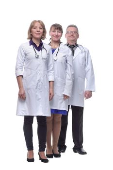 Portrait of group of smiling hospital colleagues standing together isolated over white background