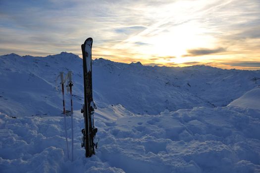 mountain snow ski with beautiful sunset in background