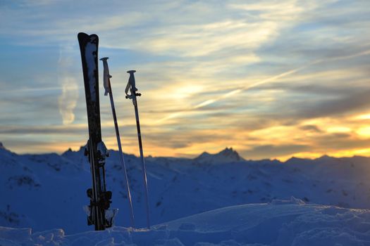 mountain snow ski with beautiful sunset in background