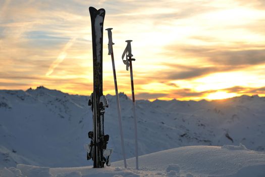 mountain snow ski with beautiful sunset in background