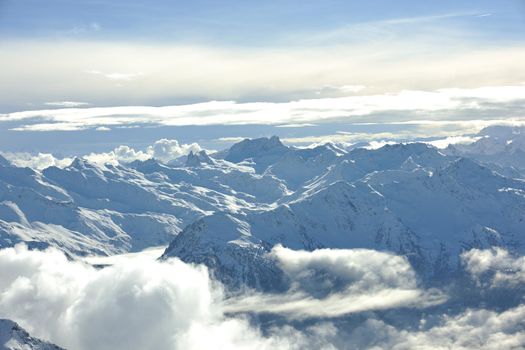 mountain snow fresh sunset at ski resort in france val thorens 