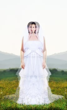 happy young beautiful bride after wedding ceremony event have fun on meadow in fashionable wedding dress