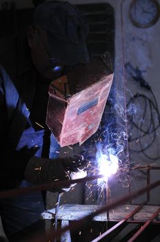 weld machine worker hard industry business