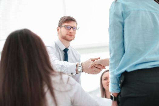 Manager welcomes the project Manager before the meeting.