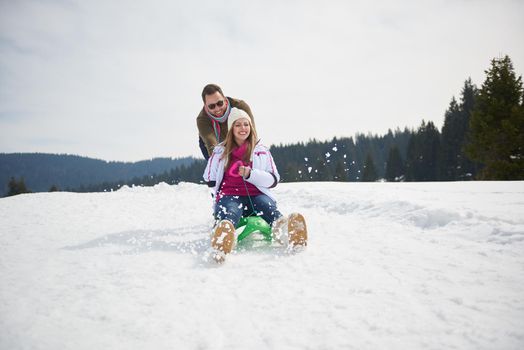 romantic winter  scene, happy young couple having fun on fresh show on winter vacatio, mountain nature landscape