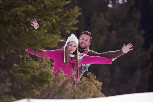 portrait of happy young romantic tourist  couple outdoor in nature at winter vacation