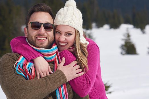 portrait of happy young romantic tourist  couple outdoor in nature at winter vacation