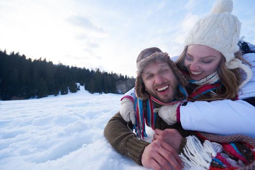 portrait of happy young romantic tourist  couple outdoor in nature at winter vacation